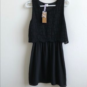 Mini black dress with beads